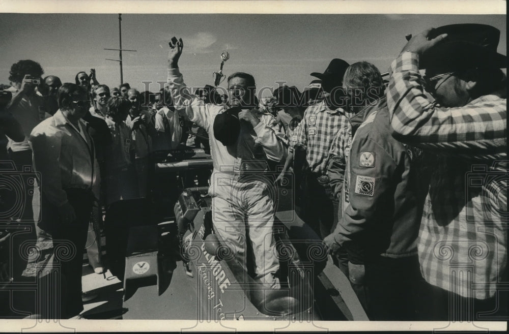 1975 Press Photo Race car driver A.J. Foyt waves to fans - mjx59962- Historic Images