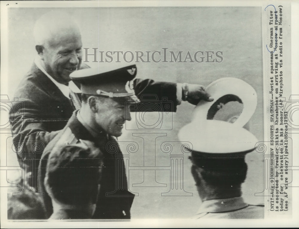 1961 Press Photo Khrushchev escorts spaceman on arriving at Moscow airport- Historic Images