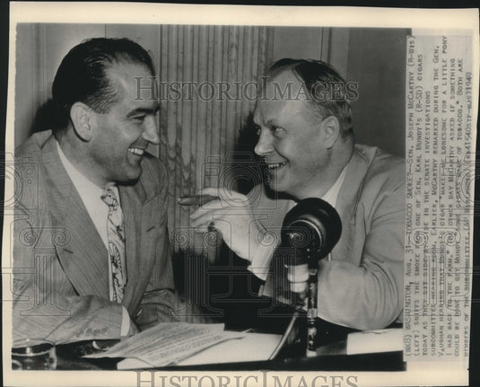 1943 Press Photo Senator McCarthy and Senator Mundt share cigar in Washington- Historic Images