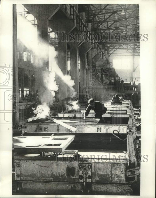 1963 Press Photo Workmen install equipment in a factory in Ulan Bator, Mongolia- Historic Images