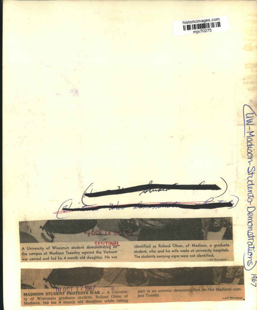 1967 Press Photo Vietnam war protestor with child at University of Wisconsin.