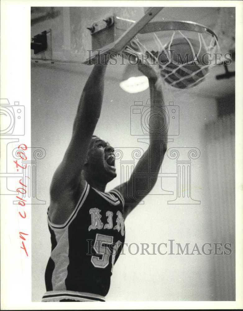 Press Photo High school basketball player dunks the ball - mjx74485- Historic Images