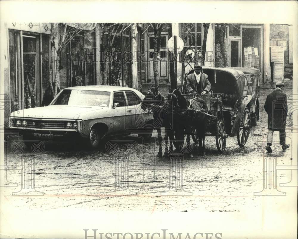 1973 Press Photo A man rides in horse drawn cab in Erzurum, Turkey - mjx76031