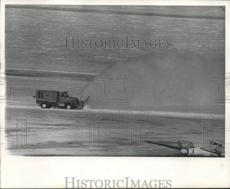 Load image into Gallery viewer, 1962 Press Photo Snow removal on landing strip at Mitchell Field in Milwaukee.
