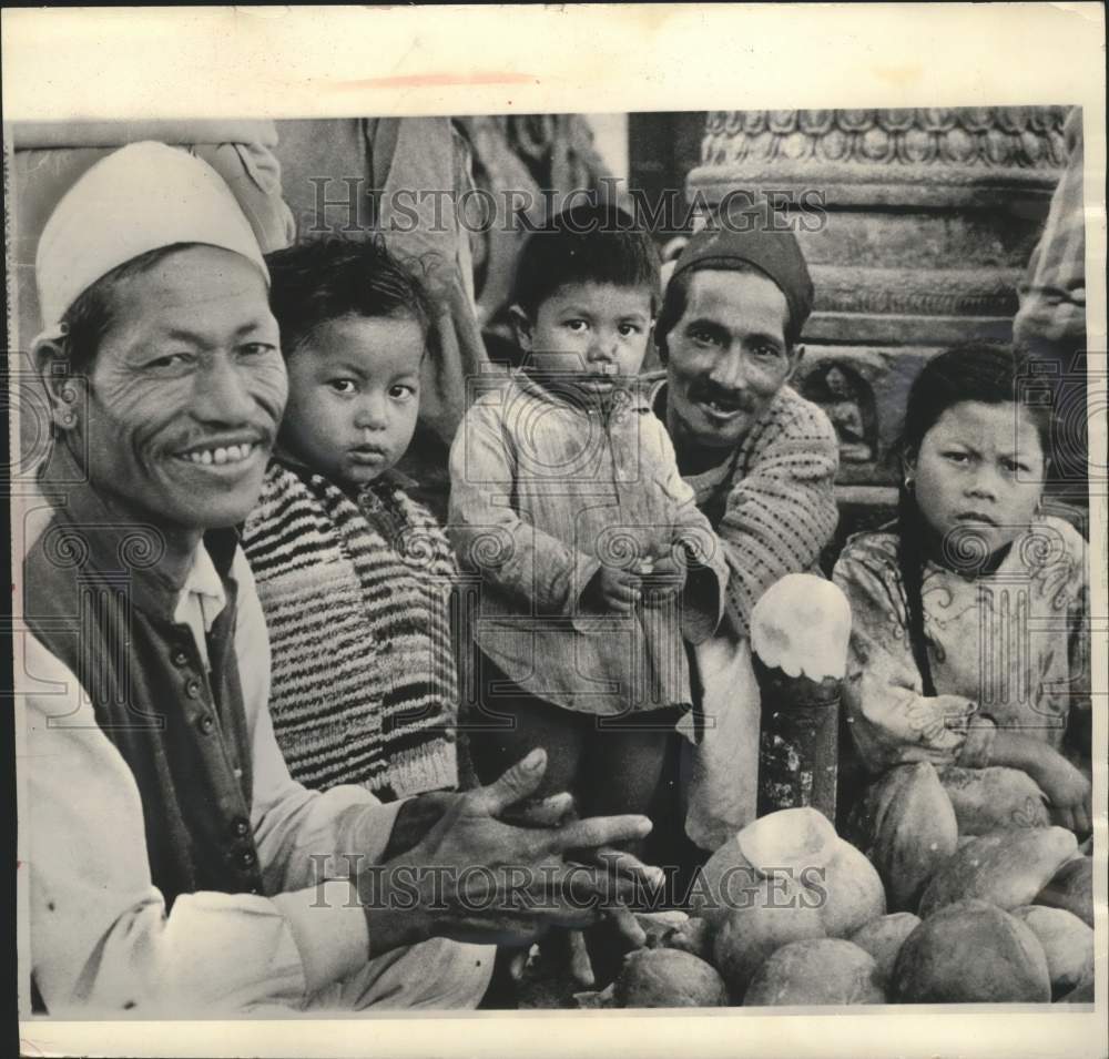 1964 Press Photo Tulsi Narayan with His Children at Sidewalk Fruit Shop in Nepal- Historic Images