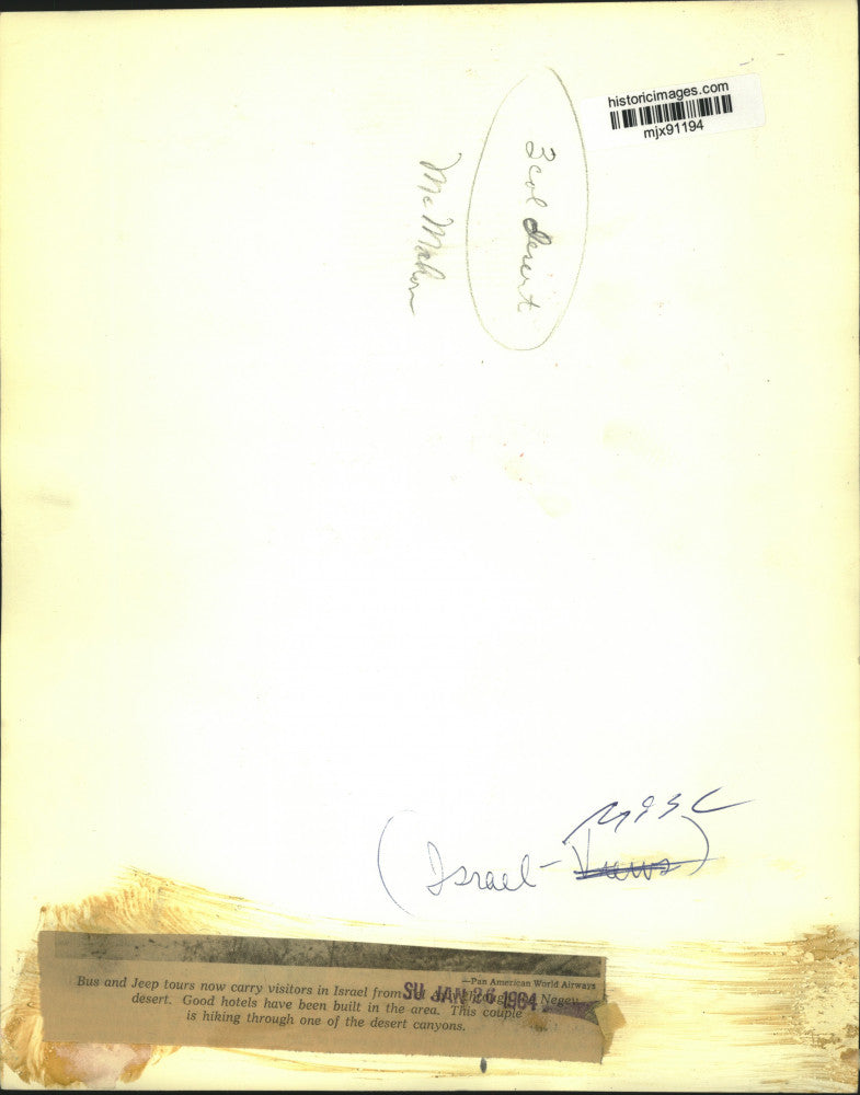 1964 Press Photo This couple is hiking through a canyon in Negev desert.