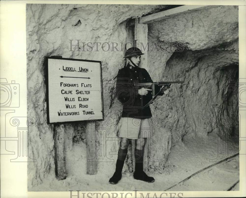 Load image into Gallery viewer, Press Photo Guard by tunnel entrance at Rock of Gibraltar - mjx96203
