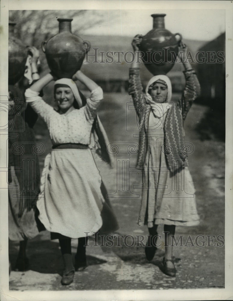 1936 Press Photo Peasant girls carry water pots in Damascus, Syria. - mjz03159- Historic Images