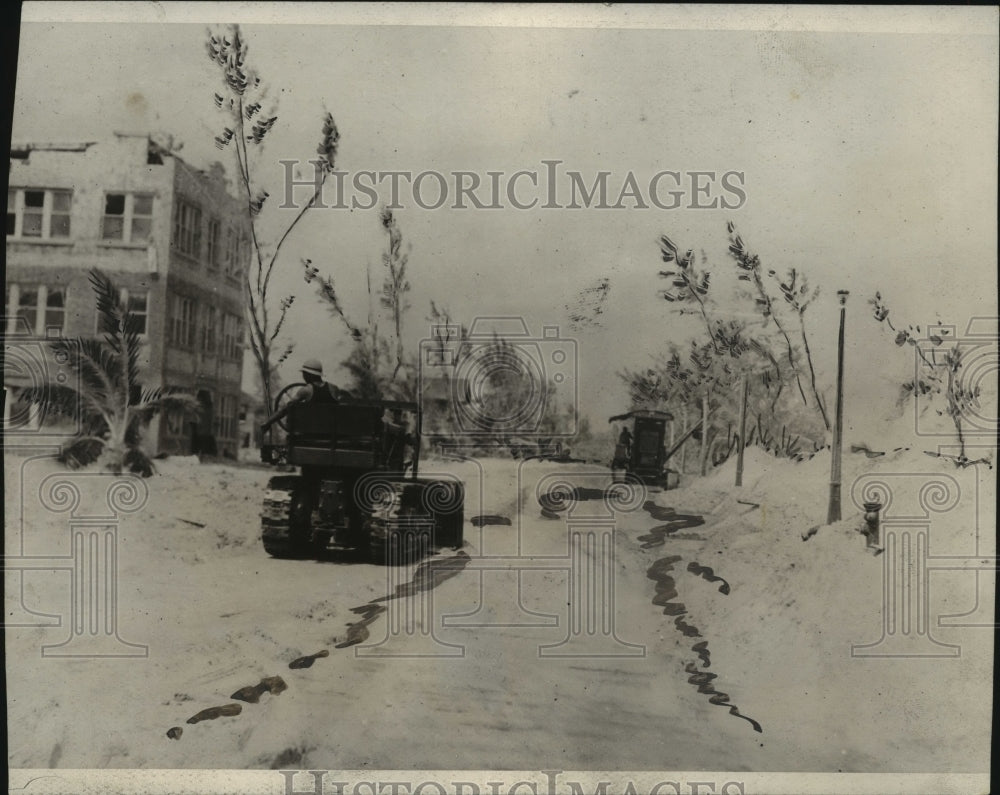 1926 Press Photo Tractor removing the sand on Ocean Dr. in Miami Beach, Florida.- Historic Images