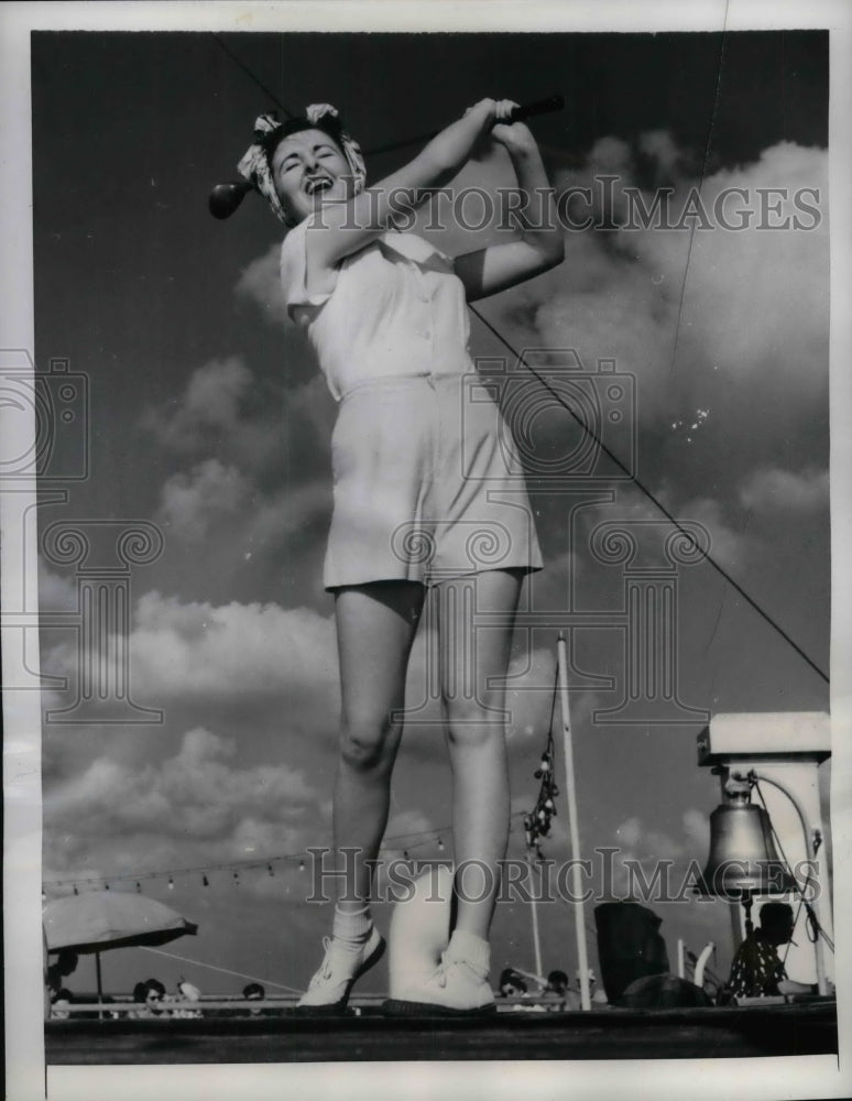 1949 Press Photo Corinne Rudolf Drives Golf Balls on S.S. Nieuw Amsterdam- Historic Images