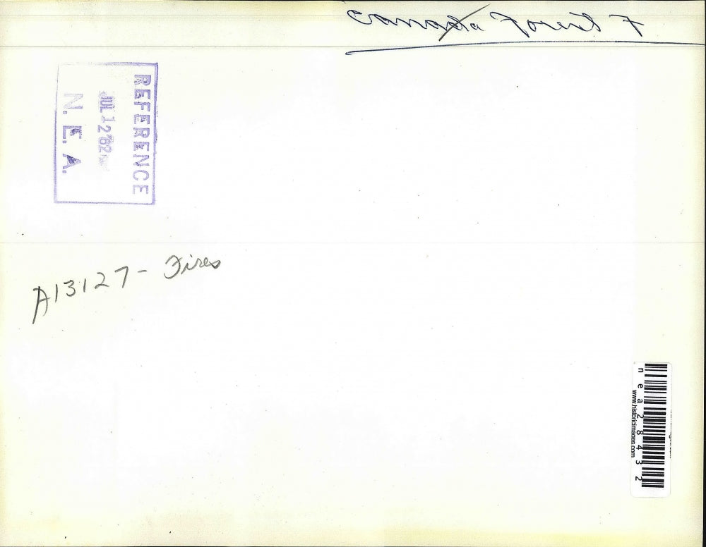 1962 Press Photo View Of Flying Aircraft Equipped With Special Spraying Water