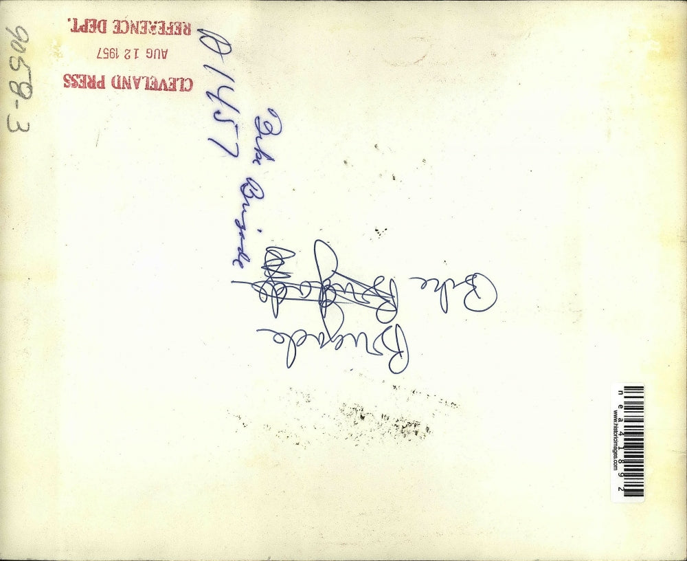 1957 Press Photo Member Of Bike Brigade Acknowledges Crowd