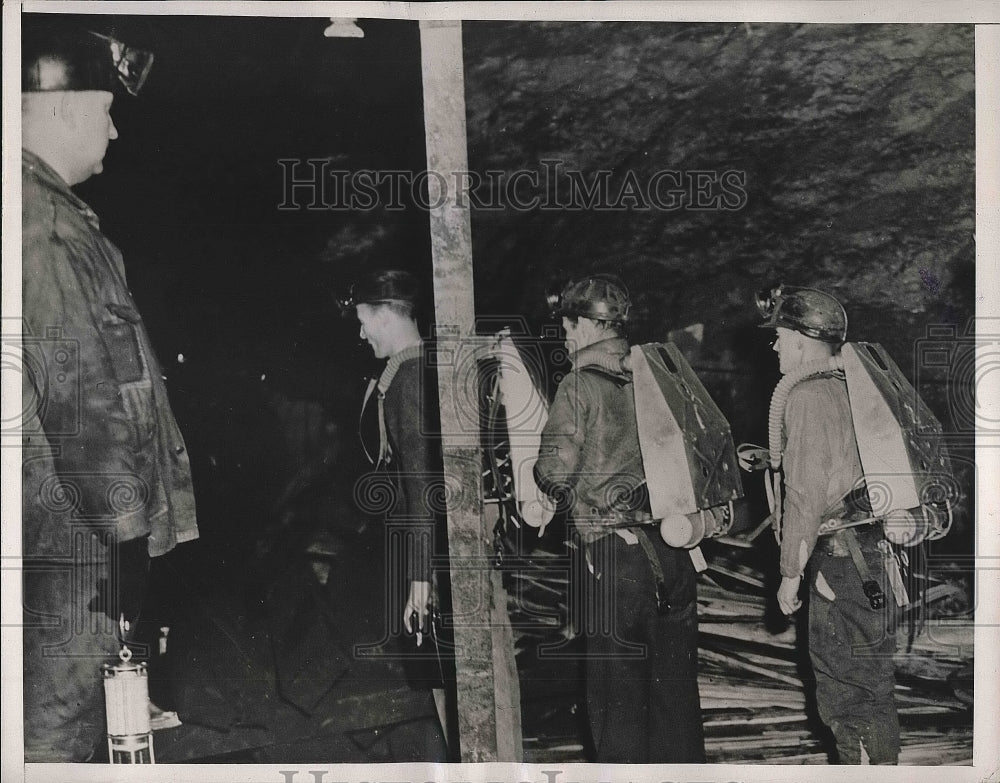 1938 Press Photo Working in relays after a explosion in the hear of the summer.