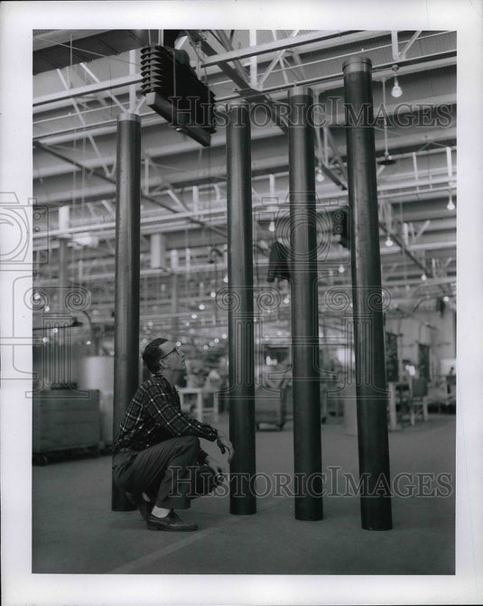 1969 Press Photo Man in a factory