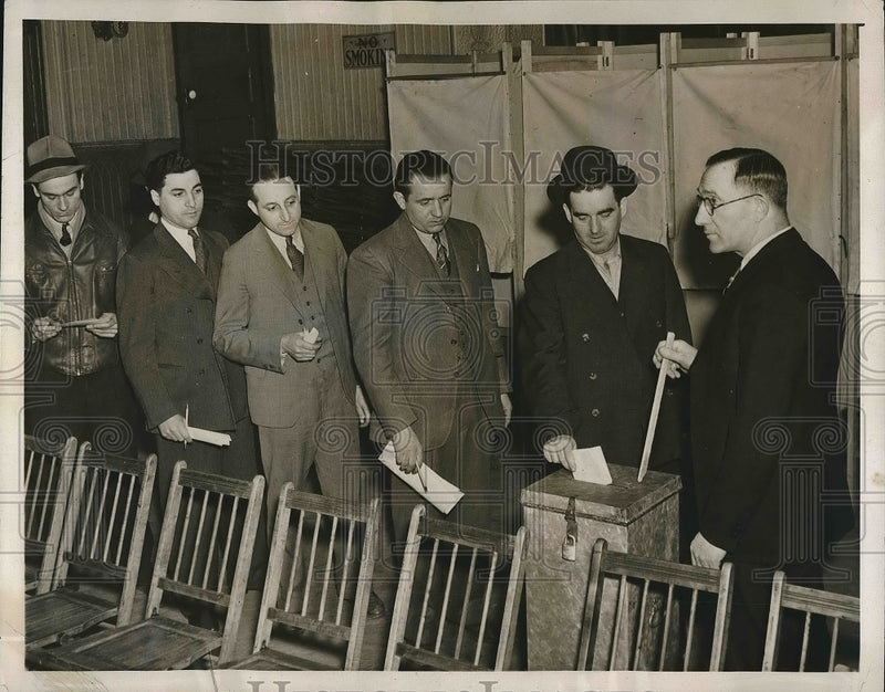 Load image into Gallery viewer, 1941 Press Photo Thomas Rowan, union official, at A.F.L. union ballot box.
