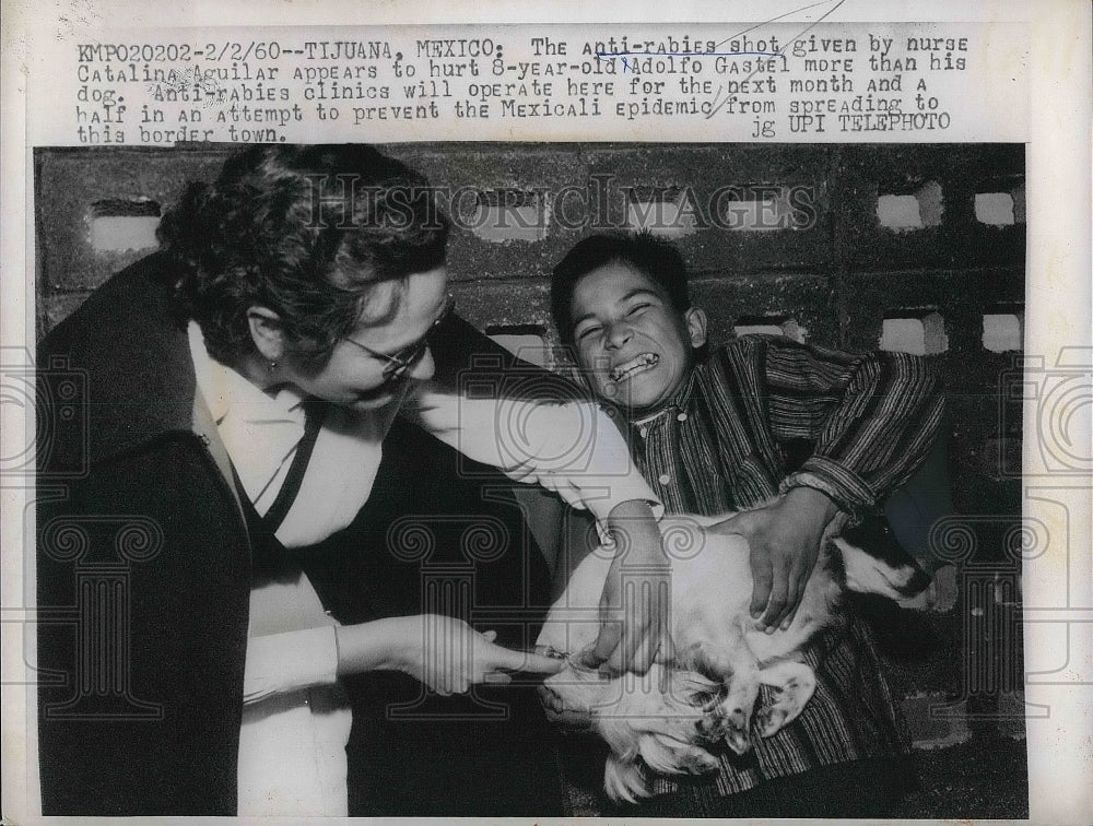 1960 Press Photo Anti Rabies Shot Given By Catalina Aguilar To 8 Year Old Boy