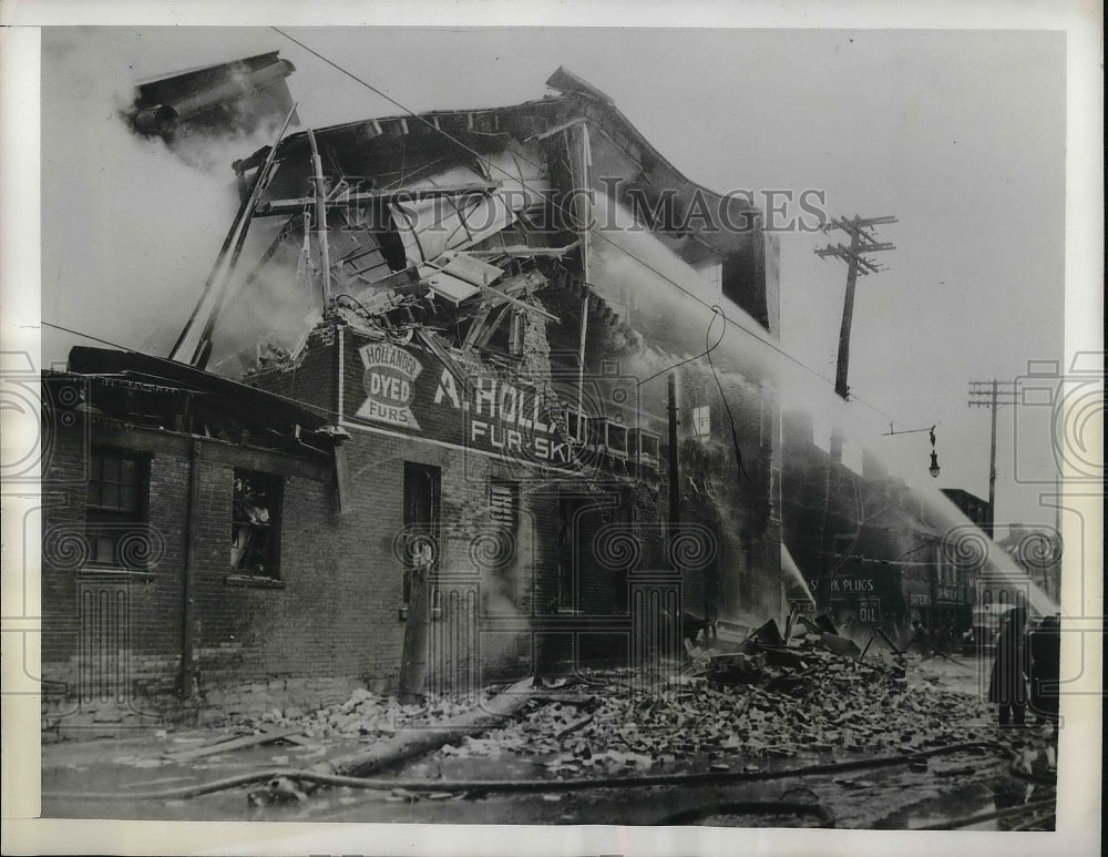 1941 Press Photo Firemen poured water at the Fur Dyeing Plant in Montreal Canada