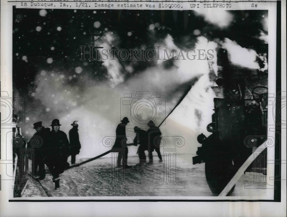 1963 Press Photo Fireman Battle Blaze at Lumber Company