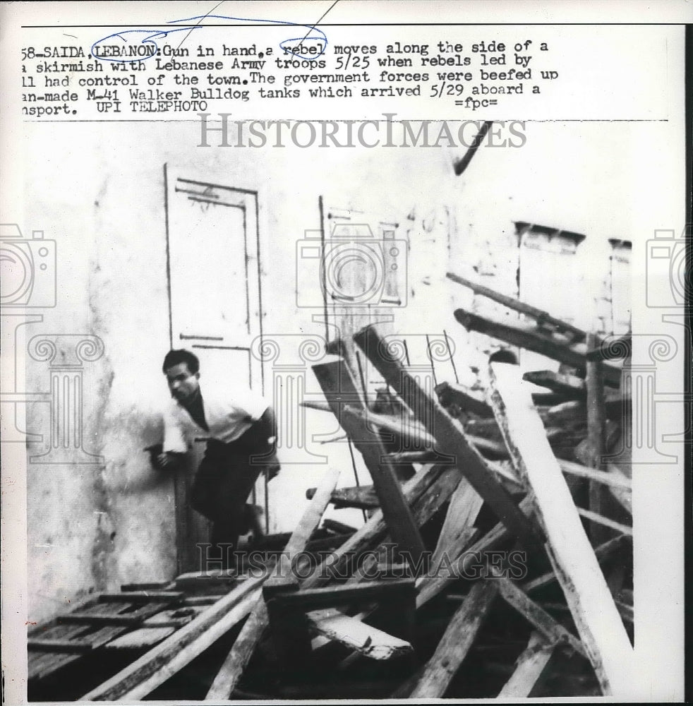 1958 Press Photo Rebel at the side of Skirmish with Lebanese Troops in Lebanon.