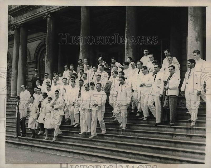 Load image into Gallery viewer, 1941 Press Photo Interns leaving city hall after meeting - neb19359
