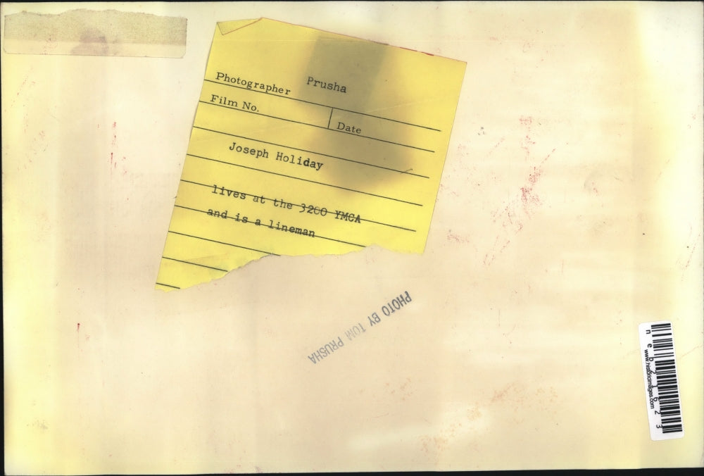 Press Photo Joseph Holiday, lives at the 3200 YMCA and is a lineman