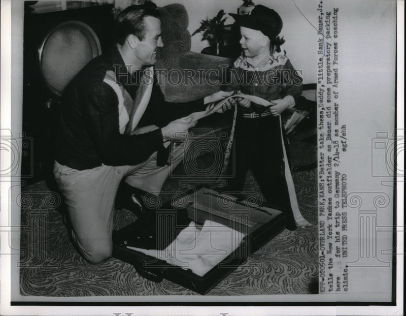 Load image into Gallery viewer, 1955 Press Photo Hank Bauer Jr Helps Father New York Yankee Hank Bauer Pack
