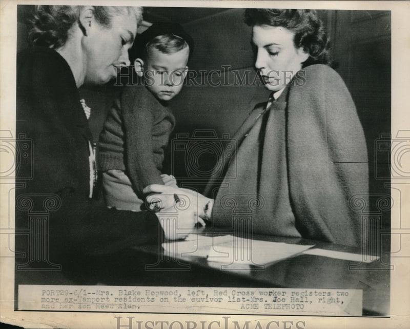 Load image into Gallery viewer, 1948 Press Photo Red Cross worker Mrs Blake Hopwood registers two survivors
