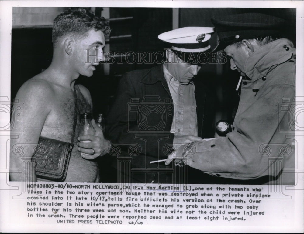 1955 Press Photo Hollywood, Cal. Roy Martins & fire officials at his burned apt