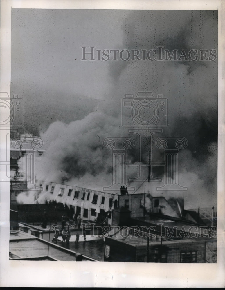 1946 Press Photo Fire burning in downtown Juneau, Alaska with no loss of life- Historic Images