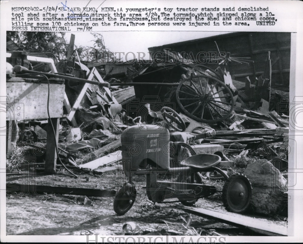 1958 Press Photo Child&#39;s Toy Tractor Among Debris From Tornado- Historic Images