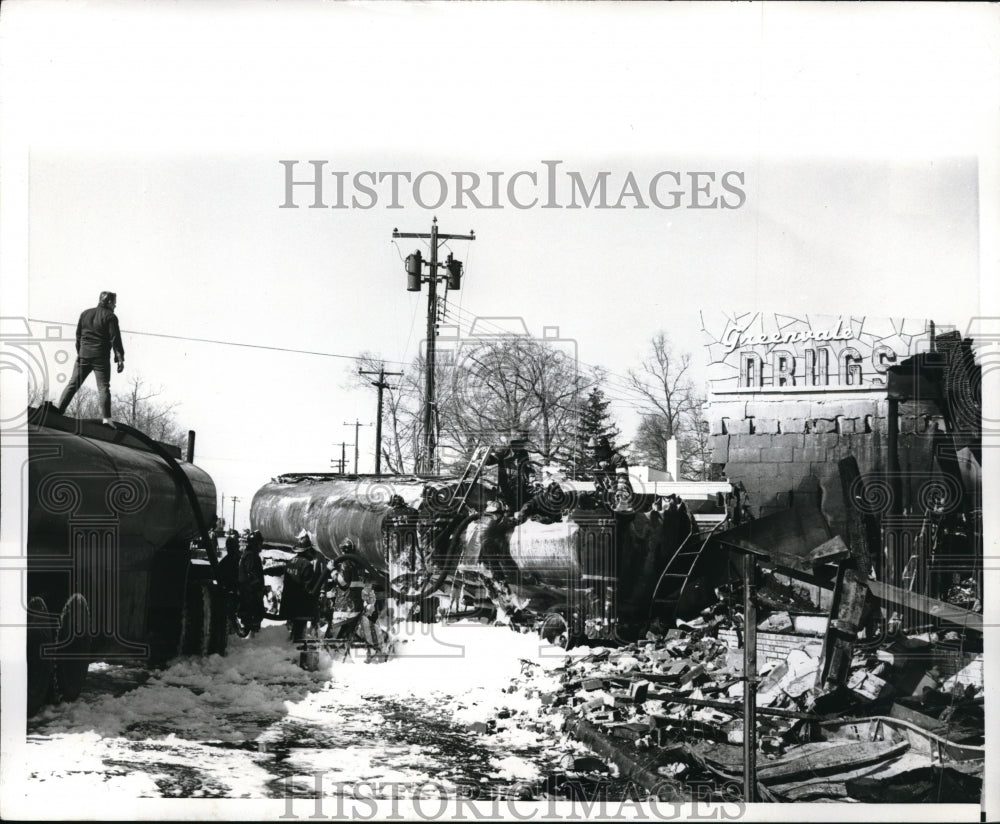 1970 Press Photo The aftermath of a train wreck with fire removed by fire men.