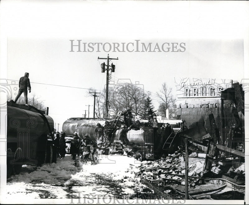 Load image into Gallery viewer, 1970 Press Photo The aftermath of a train wreck with fire removed by fire men.
