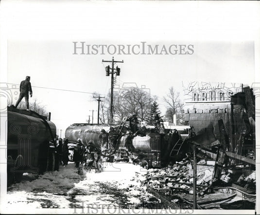 1970 Press Photo The aftermath of a train wreck with fire removed by fire men.