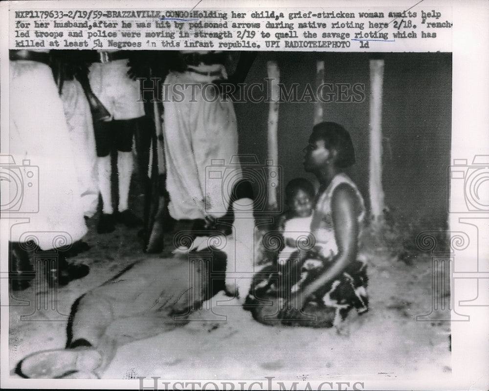 1959 Press Photo Brazzaville, Congo man hit with poisoned arrow during rioting- Historic Images