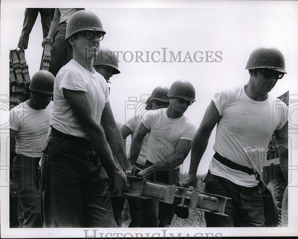 Press Photo Troops of the 194th Panel Bridge Company carry a piece of bridge in- Historic Images