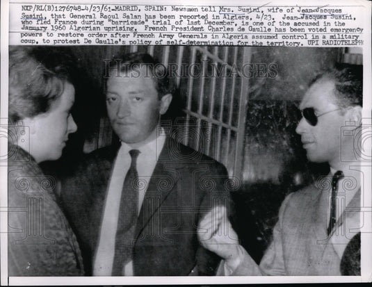 1961 Press Photo Mrs Susini Learns From Newsmen Whereabouts Of Gen Raoul Salan- Historic Images