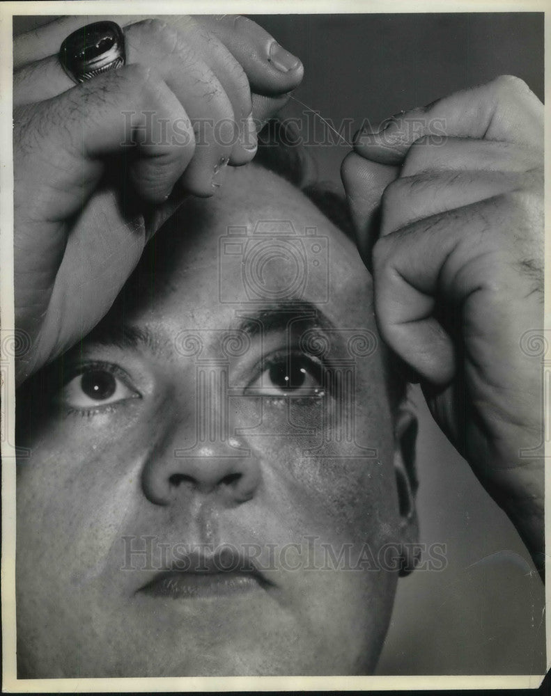 1956 Press Photo Dr. J. Herbert Holloman examines &quot;perfect&quot; iron crystal for GE- Historic Images