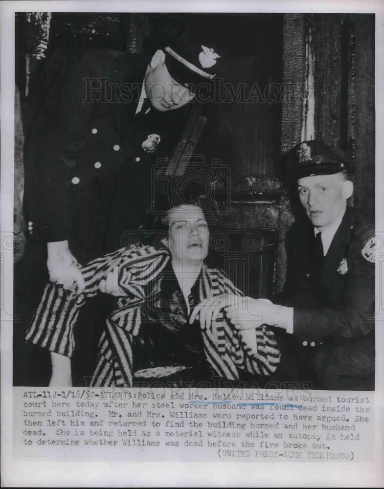 1952 Press Photo Police Aid Mrs. F. Williams Husband Dead In Burned Building - Historic Images