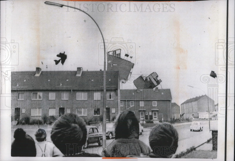 Load image into Gallery viewer, 1957 Press Photo Roofs are torn away by a raging storm hit the North Sea Region
