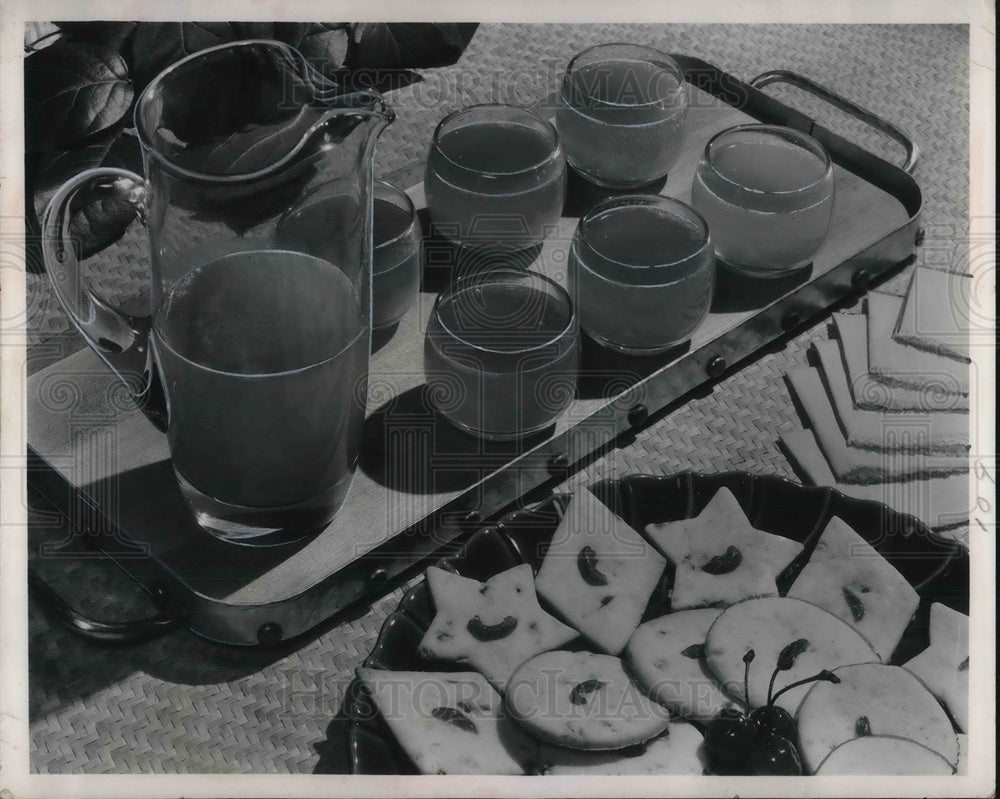 1951 Press Photo Ambrosia punch & cherry cookies on a table display - neb66304