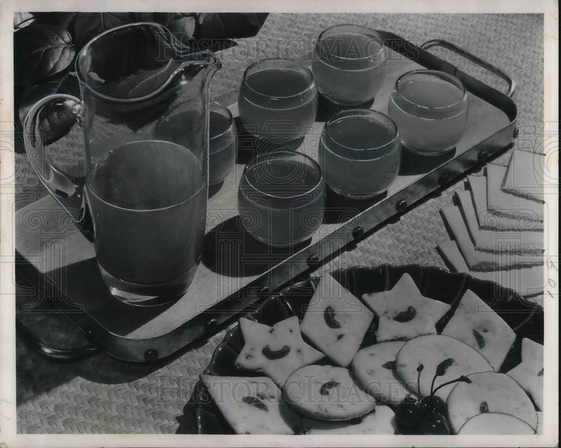 Load image into Gallery viewer, 1951 Press Photo Ambrosia punch &amp; cherry cookies on a table display - neb66304
