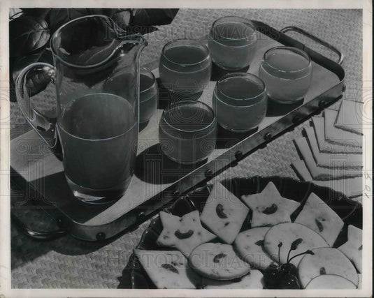 1951 Press Photo Ambrosia punch & cherry cookies on a table display - neb66304