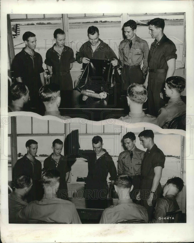 Load image into Gallery viewer, 1941 Press Photo Aviation Cadet B Connell shows magic to his classmates
