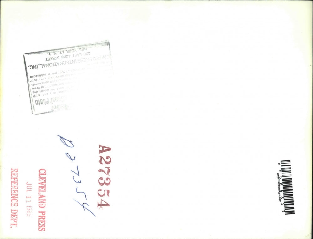 1966 Press Photo Four year old Peggy Yuan embraced by parents - neb66853