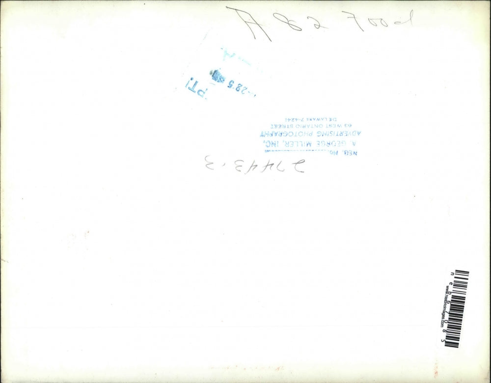 1955 Press Photo A platter of baked sweet potatoes with green bean garnishes