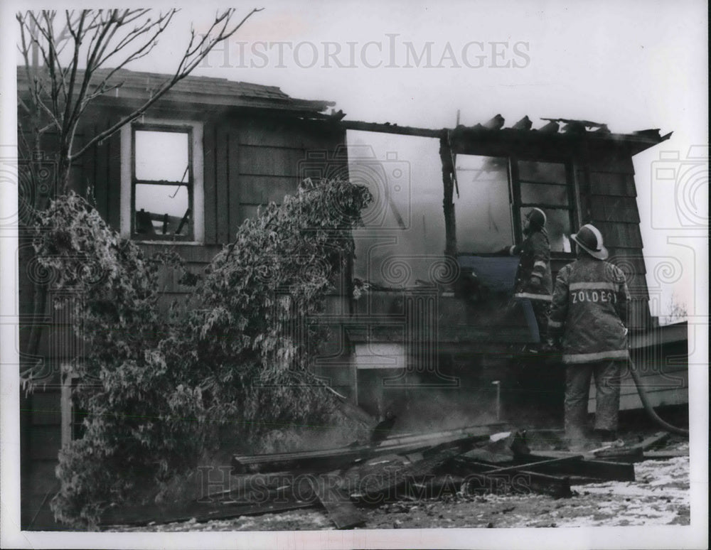 1967 Press Photo Firemen fight blaze in small home - neb67265