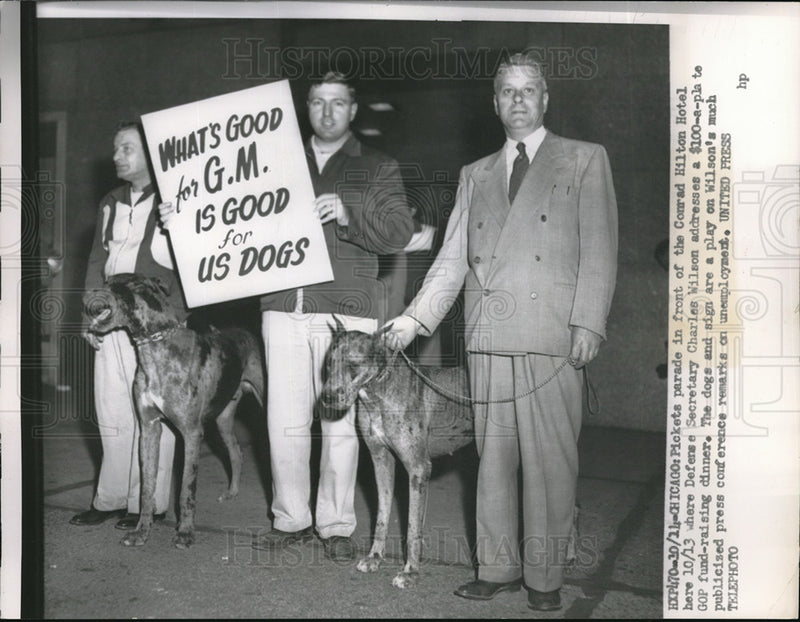 Load image into Gallery viewer, 1954 Press Photo Defense Secretary Charles Wilson with demonstrators at Chicago
