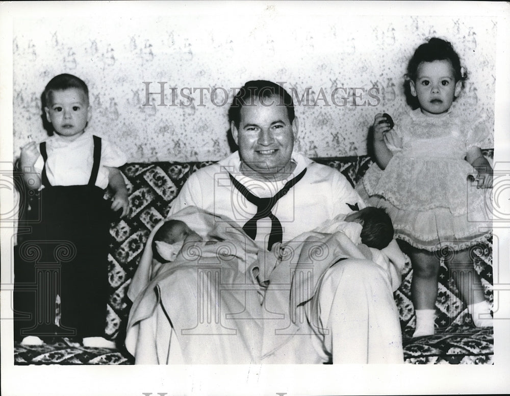 1955 Press Photo Naples, Italy Radioman 1/c Philip J Hogan & his 2 sets of twin