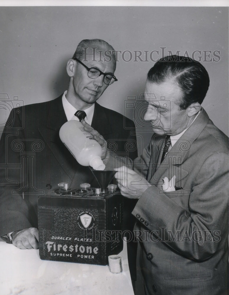 1962 Press Photo G.V. Meade, L.E. Olcott Auto Battery