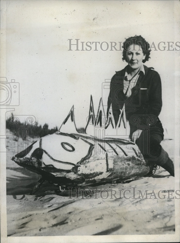 1934 Press Photo Katherine Dahringer Sits on Sea Serpent Found at Lake Michigan- Historic Images